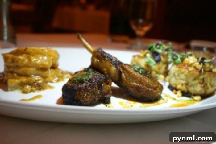 Pechanga Resort and Casino: A Deep Dive into the Experience 7 An elegantly plated steak with asparagus and risotto at The Great Oak Steakhouse, showcasing fine dining cuisine in a sophisticated setting.