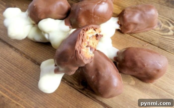 Snickers turkey drumsticks are so fun to make at Thanksgiving! Perfect edible Thanksgiving craft for kids or just make to serve as dessert. #thanksgiving #dessert #treat #drumsticks #legs #turkey #snickers #candy Finished Chocolate Turkey Leg Treats