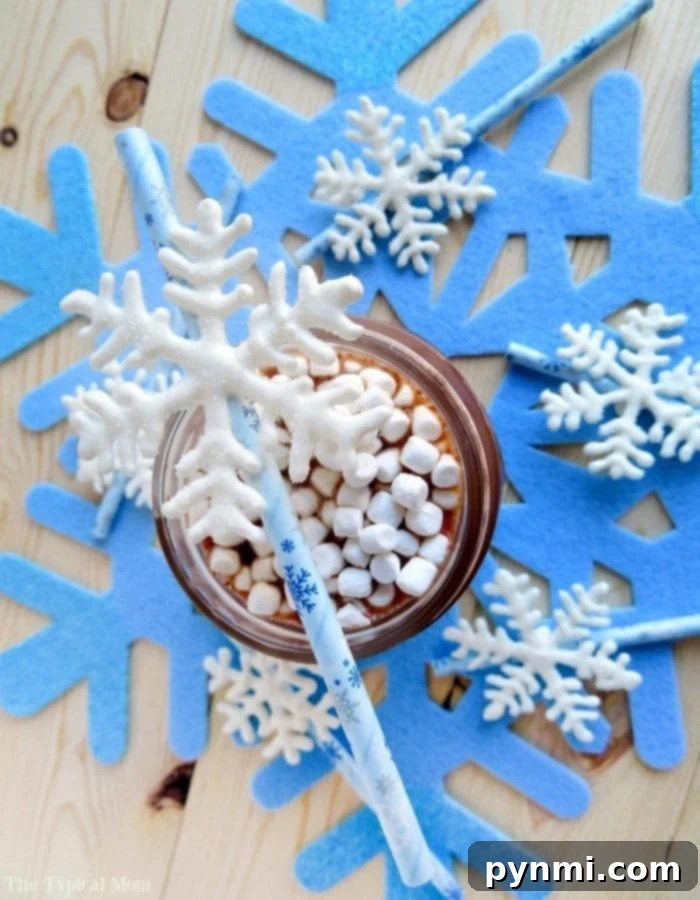 Delicious chocolate snowflake stirrers, perfect for enhancing hot chocolate during Christmas or a Frozen-themed party, featuring delicate white chocolate designs.