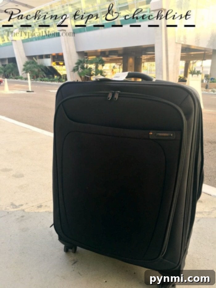 Smart Vacation Packing Your Free Checklist 4 Traveler packing suitcase with Head & Shoulders shampoo