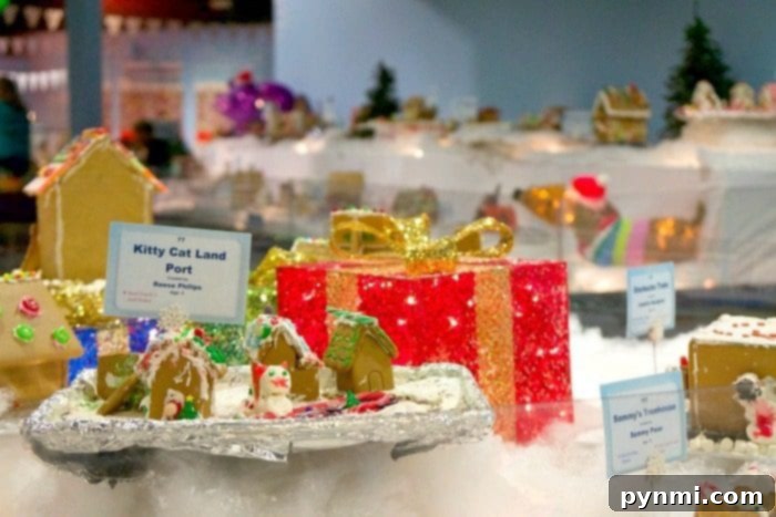 Children decorating gingerbread at Discovery Cube OC Winter Wonderfest exhibit.