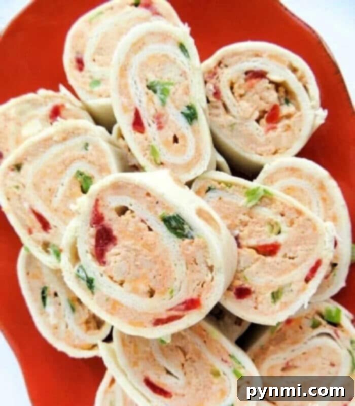 Creamy Philly Tortilla Pinwheels 2 Delicious Tortilla Philadelphia Cream Cheese Pinwheels, sliced and arranged on a platter