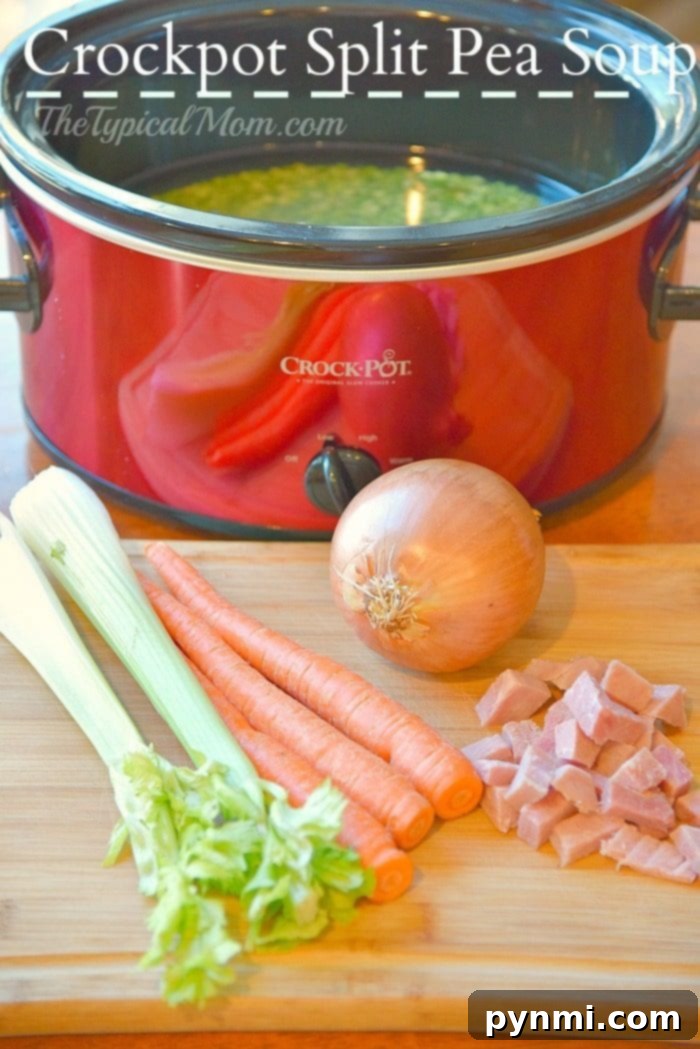 Crockpot split pea soup recipe that is so easy to make and a healthy slow cooker dinner you can make year round! Inexpensive dinner and perfect when it's cold outside. Great using leftover ham too after the holidays. A rustic bowl filled with creamy crockpot split pea soup, garnished with fresh herbs and served on a wooden surface.