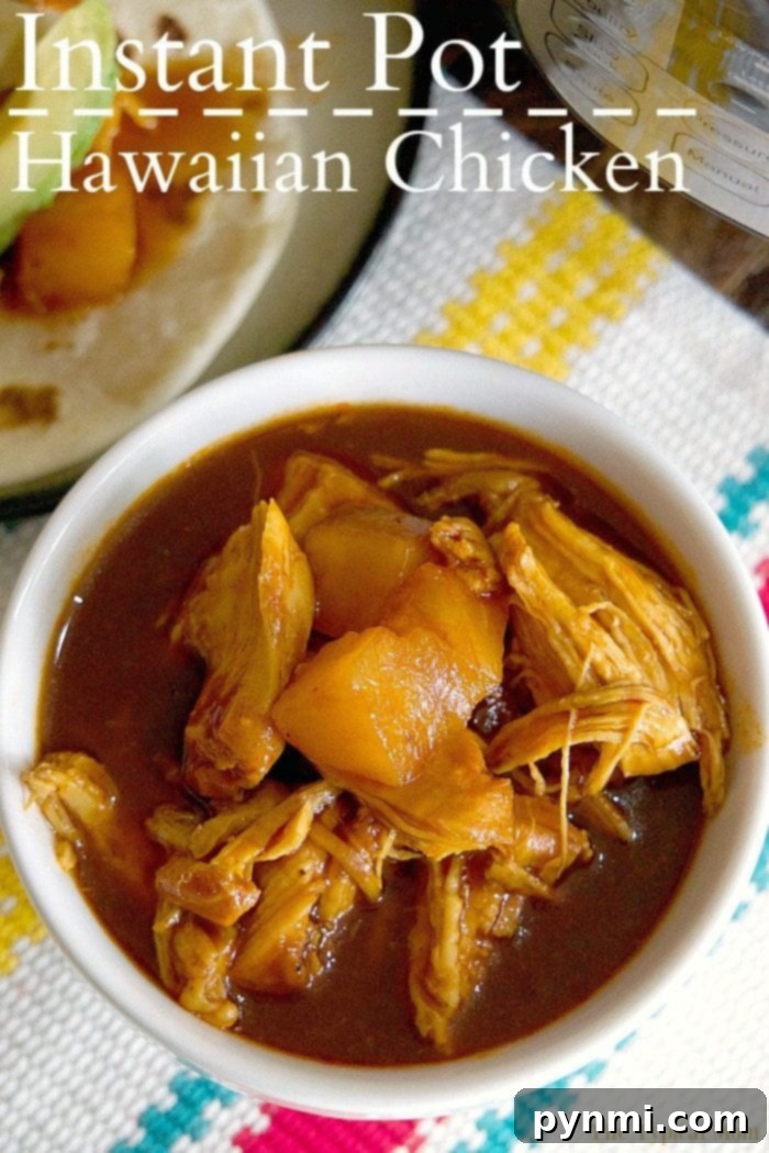 Instant Pot BBQ Pulled Chicken 3 Bowl of Instant Pot shredded Hawaiian chicken with pineapple chunks and sauce.