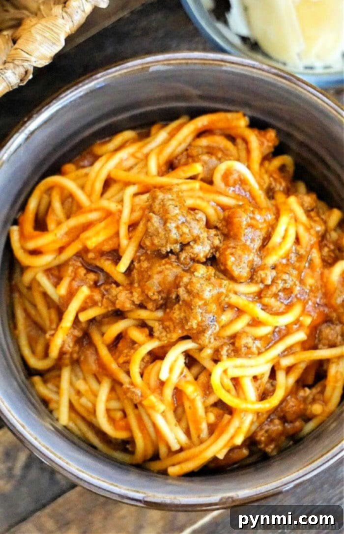 Effortless Instant Pot Spaghetti 2 Instant Pot spaghetti with jar sauce and ground beef, ready to serve in a pressure cooker