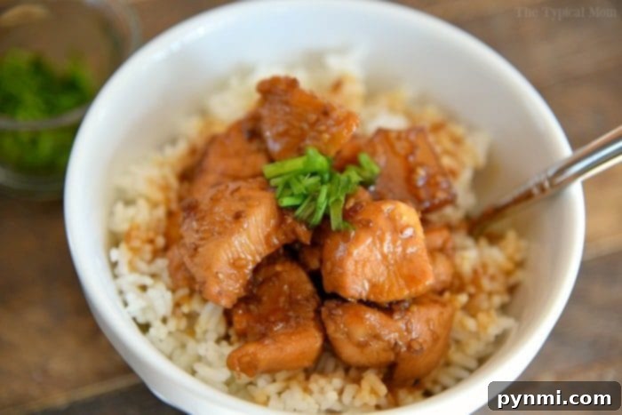 An incredibly easy 3-ingredient Instant Pot Teriyaki Chicken recipe that cooks in just 4 minutes, delivering tender, flavorful results. A healthy, budget-friendly pressure cooker meal that's a family favorite, especially served over rice with pineapple. Serving of pressure cooker teriyaki chicken with pineapple chunks and green onions.