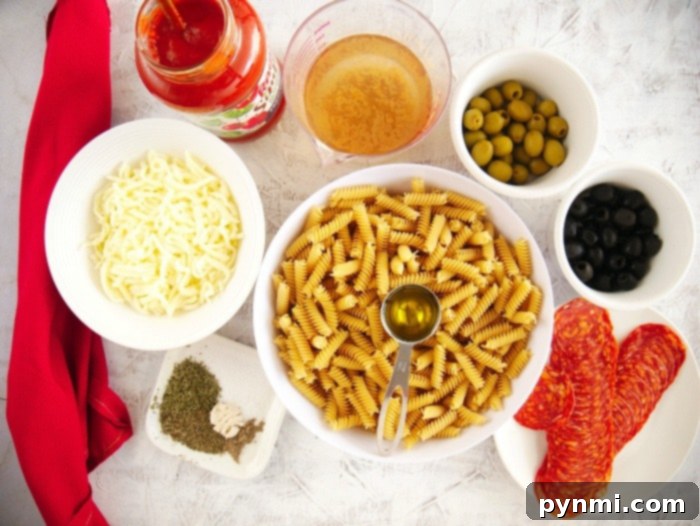 Ultimate Instant Pot Pizza Pasta 3 Hearty pizza pasta, brimming with sauce and toppings, served in a bowl, with a pressure cooker blurred in the background, symbolizing convenience.