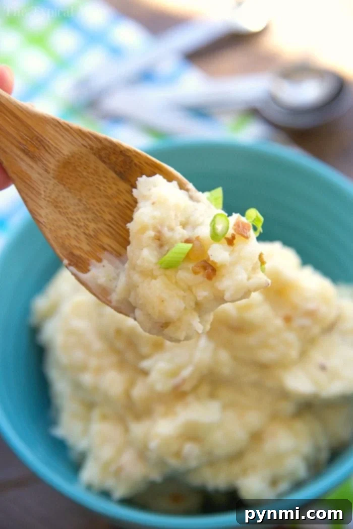 Amazing 6-Minute Instant Pot Mashed Potatoes - Easy & Fast A close-up shot of fluffy Instant Pot mashed potatoes in a pristine white serving bowl, highlighting their smooth, creamy texture and appetizing appeal. Perfectly prepared, they are ready to be enjoyed as a comforting side dish.