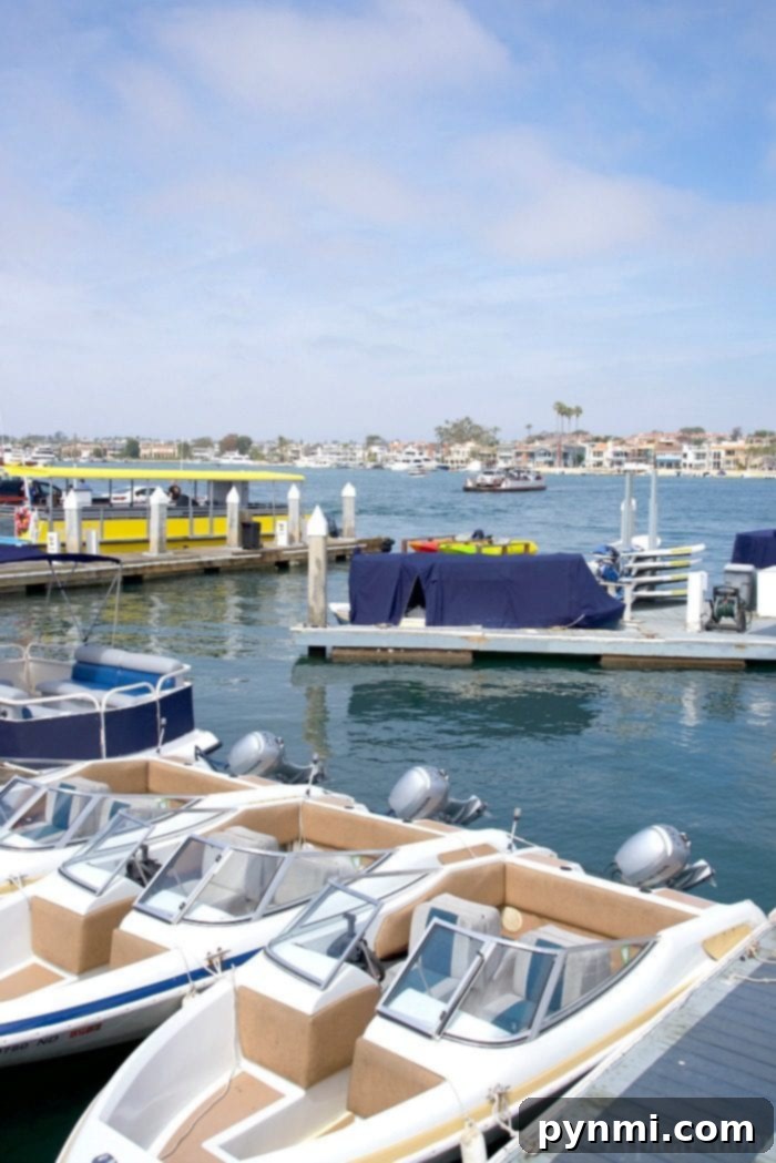 Beautiful Balboa Beach with calm waves and clear skies
