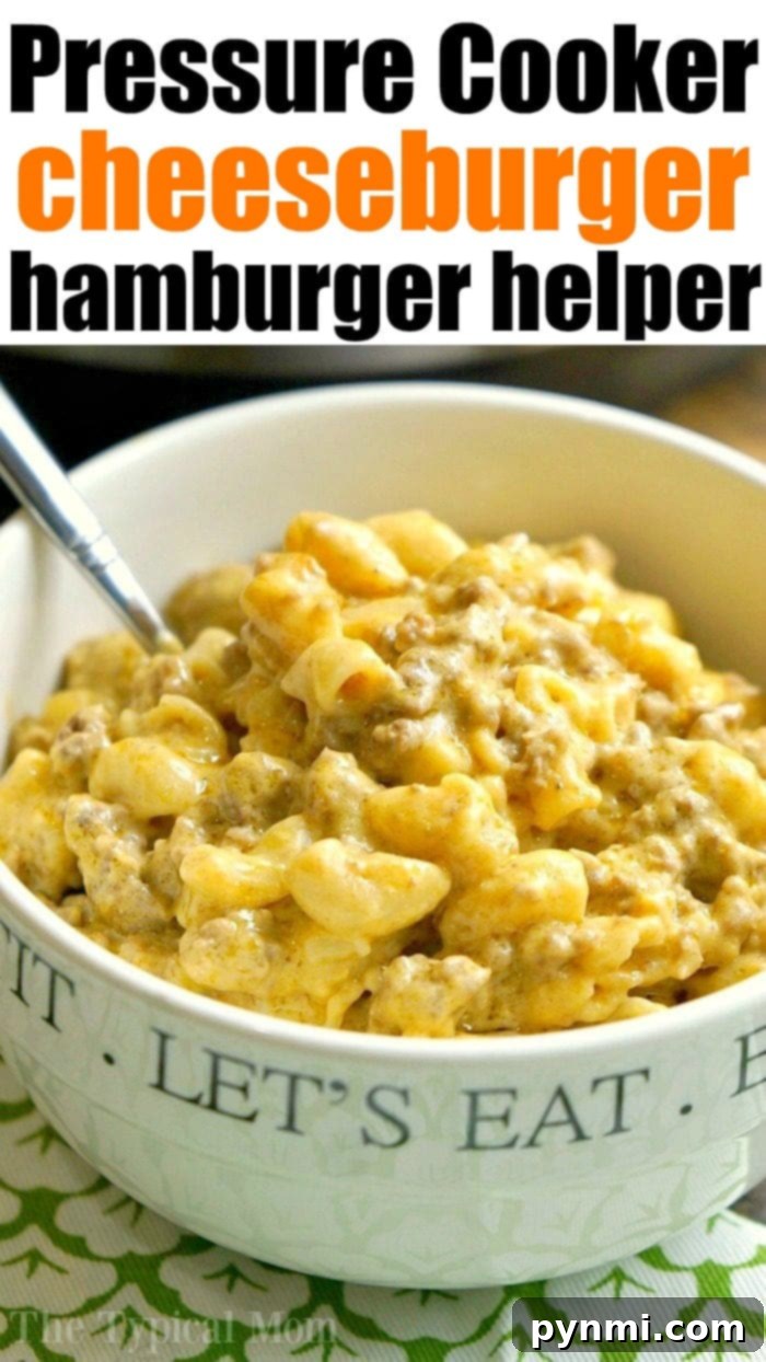 A large serving bowl filled with creamy Instant Pot Cheeseburger Macaroni, garnished with fresh herbs, ready for a family dinner.