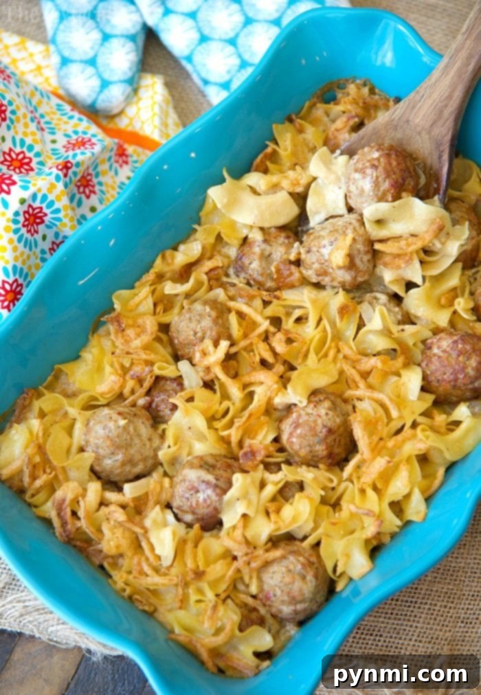 Close-up of creamy Swedish Meatball Casserole with golden topping