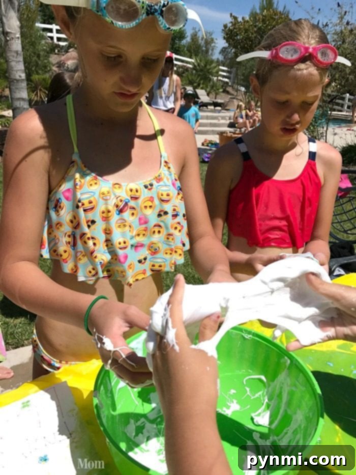 Kids having a blast at a DIY slime creation station during a birthday party. Children enthusiastically mixing ingredients to create colorful slime