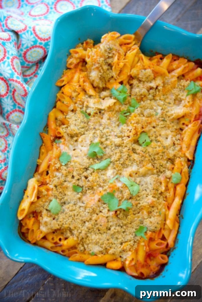 This easy chicken parmesan casserole recipe tastes great and is a great weeknight meal when you're busy! No boiling required just dump, bake, and serve! easy chicken parmesan casserole