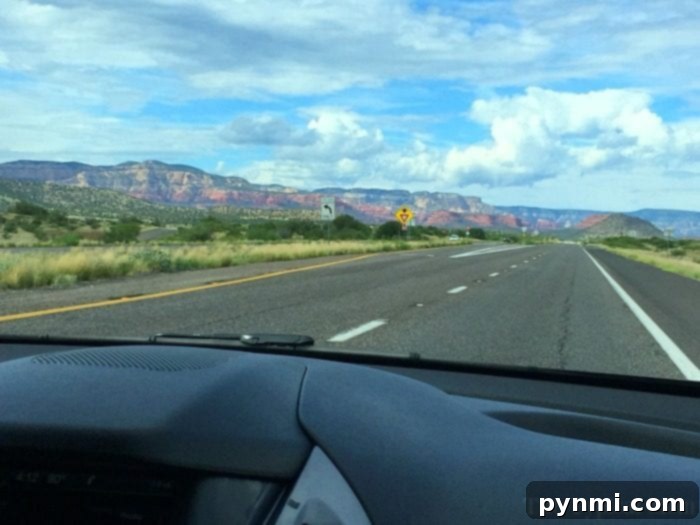 Unforgettable and affordable cheap weekend trips your whole family will love! Discover budget-friendly getaways and travel tips. Family enjoying a scenic road trip, symbolizing cheap weekend trips and adventure