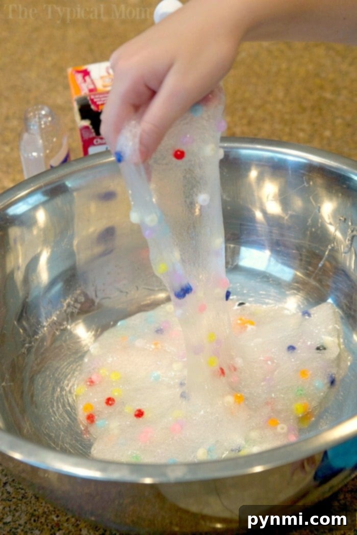 Easy baking soda clear slime recipe with glitter