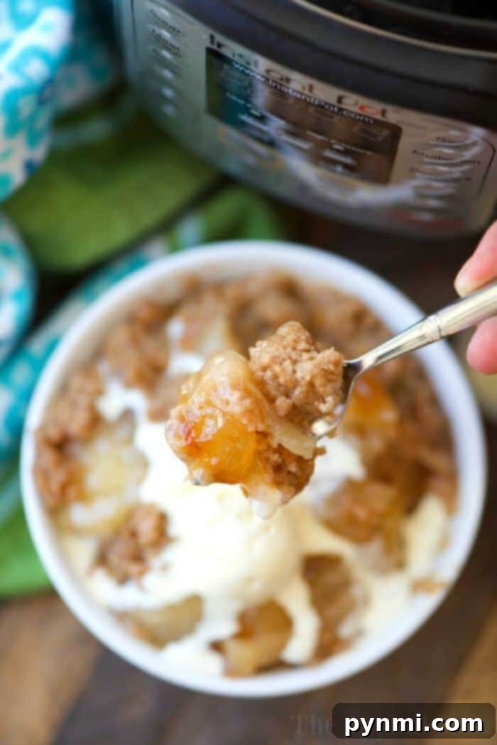 Instant Pot Magic Cake 2 Delicious Instant Pot dump cake, made with cake mix and pie filling, topped with a scoop of melting ice cream. A perfect pressure cooker dessert for the family.