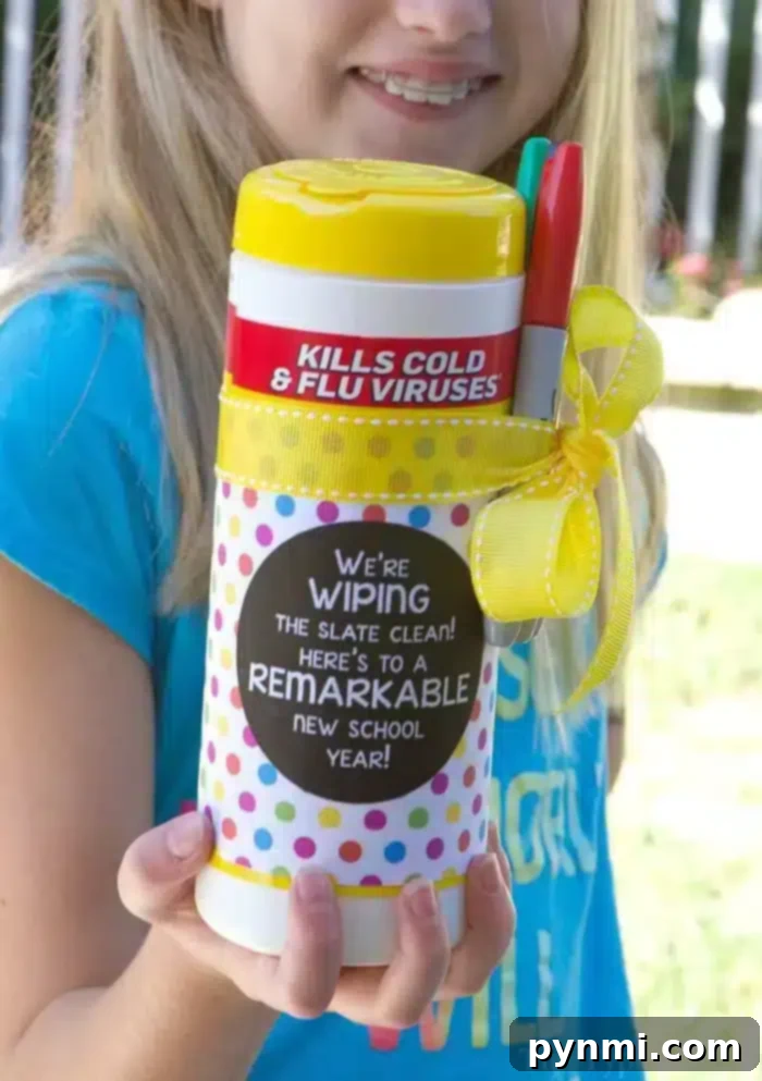 A flat lay of various free back to school printables, featuring a cheerful morning routine checklist, 'About Me' page for kids, and colourful first day of school signs.