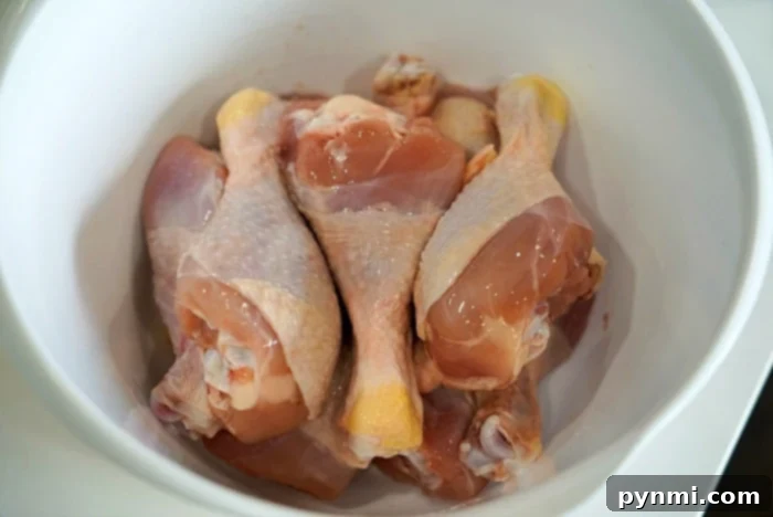Our Take On Kentucky Fried Chicken 3 Preparing chicken legs for frying