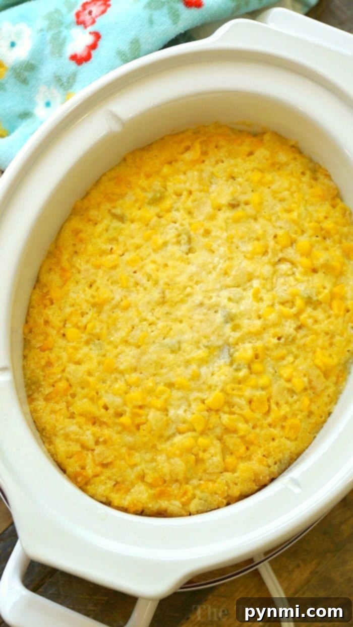 Set It and Forget It Creamy Corn Casserole 2 Easy Crockpot Corn Casserole Recipe 2 - Cheesy, moist, and sweet Jiffy corn pudding perfect for holiday side dishes.