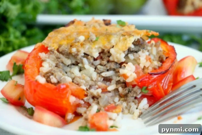 Effortless Instant Pot Stuffed Peppers 7 Air fryer stuffed bell peppers, showing a crispy top.