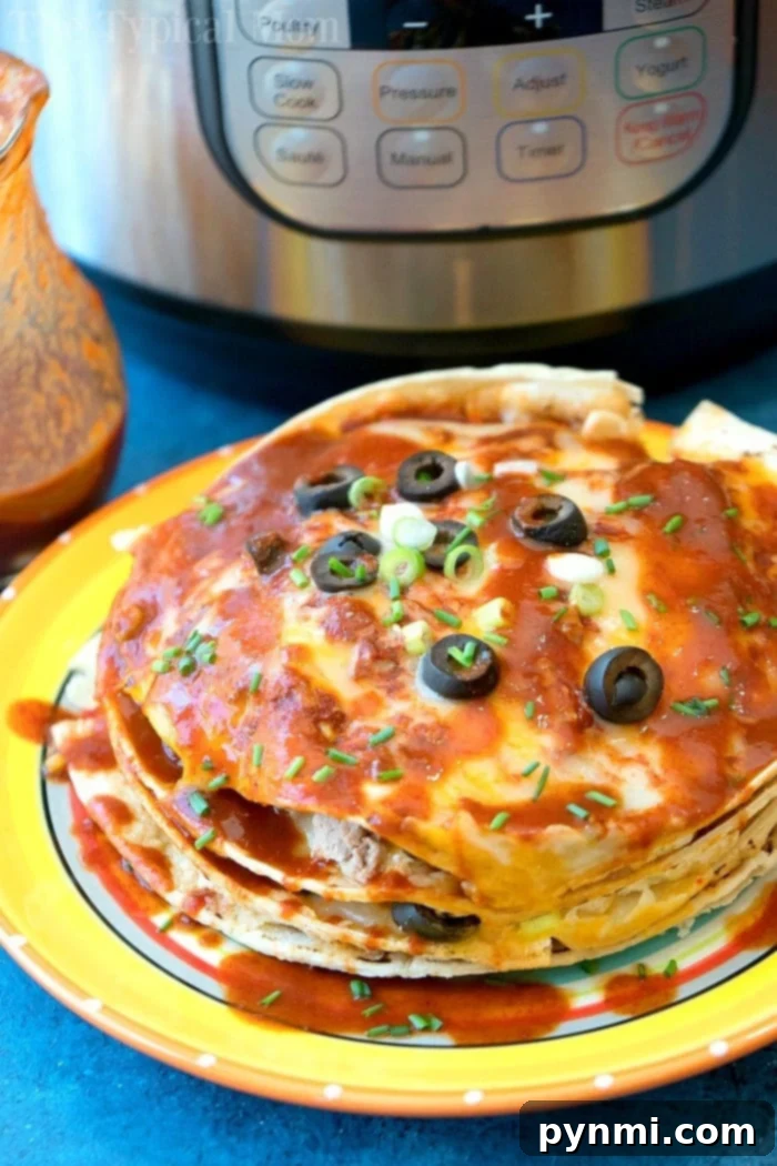 Instant Pot Mexican pizza is amazing!! With layers and layers of cheese, sauce and ground turkey it's like a wonderful enchilada lasagna! #instantpot #mexicanpizza #pizza #pressurecooker #instantpotrecipes #thetypicalmom instant pot mexican pizza