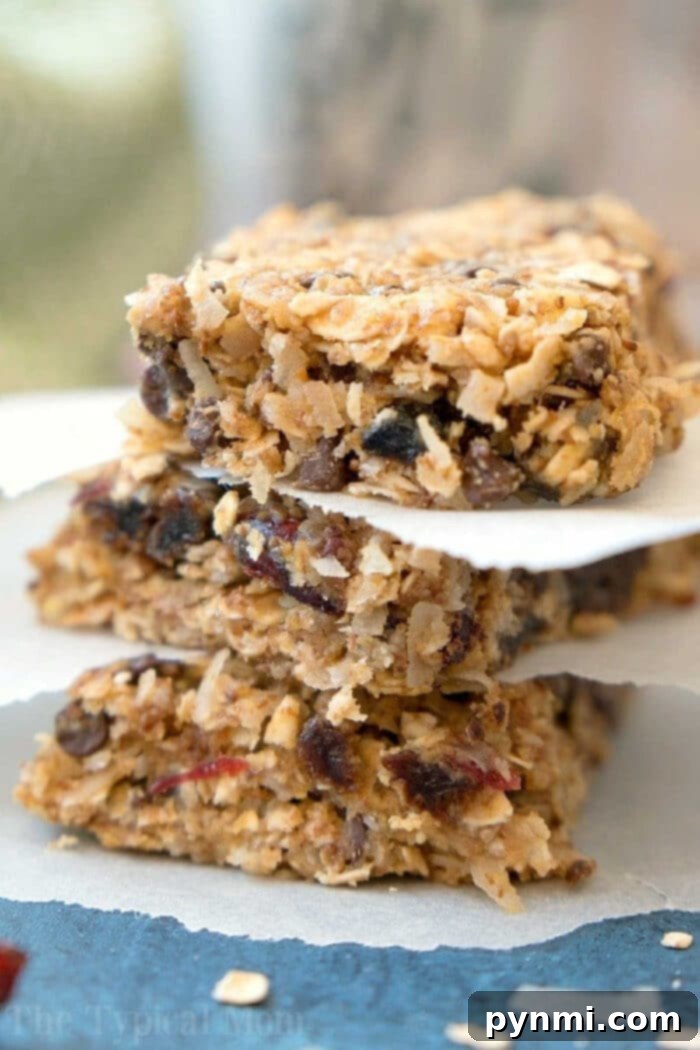 Delicious and super chewy homemade granola bars with oats, coconut, and chocolate chips ready for a snack