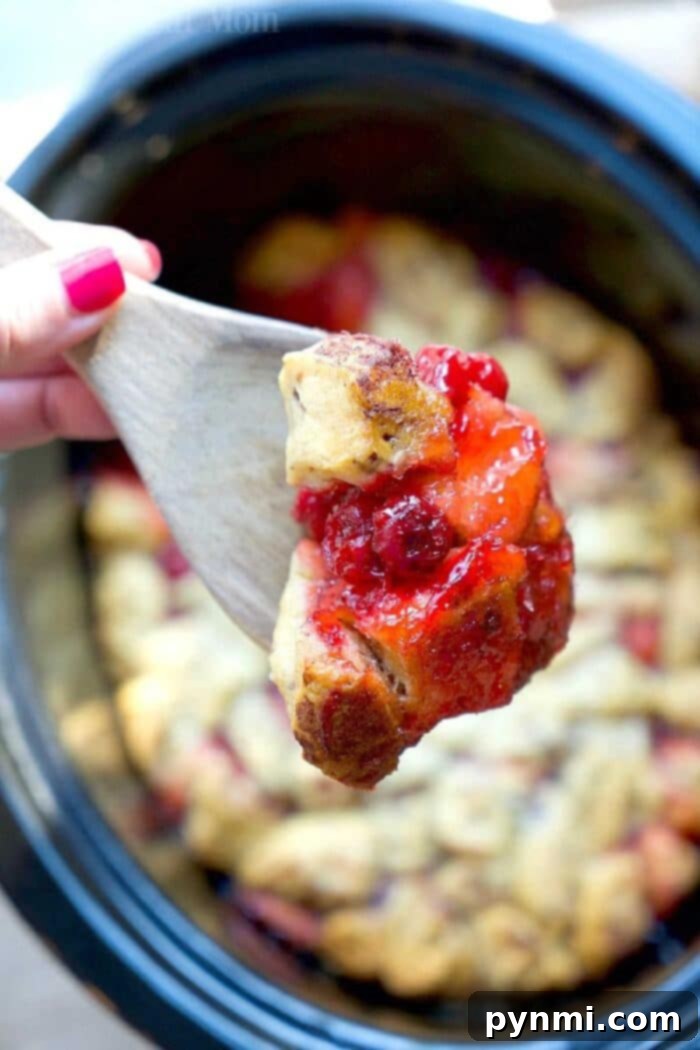 Crockpot Cinnamon Roll Monkey Bread with Cherry Pie Filling, perfect for breakfast or dessert.