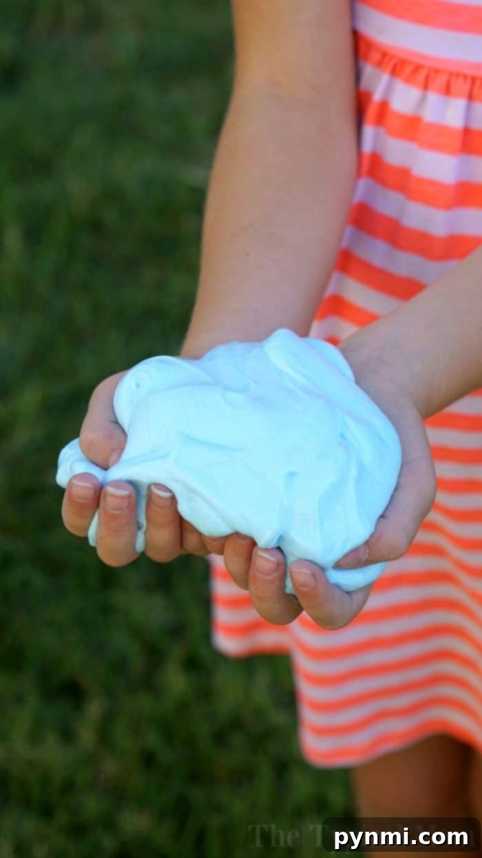 Children enjoying fluffy slime made with just 3 ingredients and no borax! A safe, soft, and customizable slime recipe for endless fun. Simple and engaging! kids playing with fluffy slime