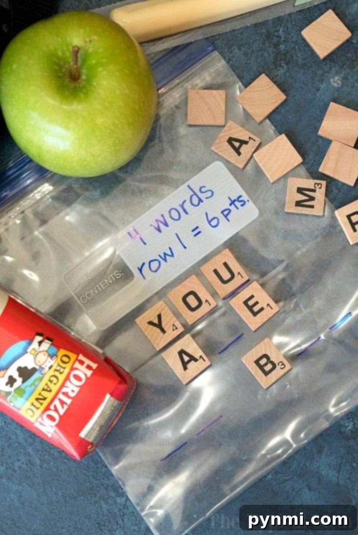 Free Lunch box game for kids has everyone talking! My kids and their friends love playing each day with these printable Scrabble tiles. #lunchbox #game #notes #printable Kids playing a lunch box hangman game with Scrabble tiles