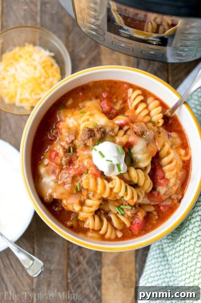 Easy Instant Pot pasta recipes to get you started with your pressure cooker! Simple soups and main dishes with pasta in them that we love. #instantpotrecipes #instantpot #ninjafoodirecipes #ninjafoodi #thetypicalmom #pasta instant pot taco casserole 2 - a hearty pasta dish with ground meat and cheese