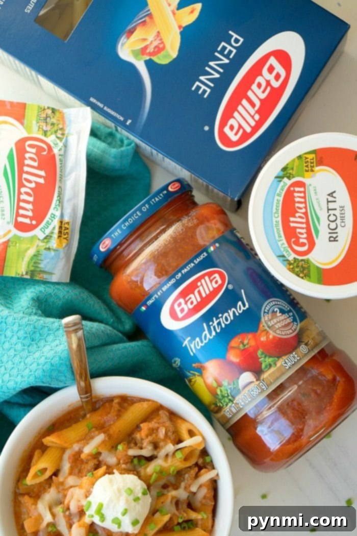 Easy Pressure Cooker lasagna casserole recipe our whole family loves. Cheesy Instant Pot lasagna but in a casserole which makes it much easier to make! #instantpot #lasagna #casserole #pressurecooker #instantpotrecipes #thetypicalmom pressure cooker lasagna casserole with penne, ricotta cheese, and spaghetti sauce