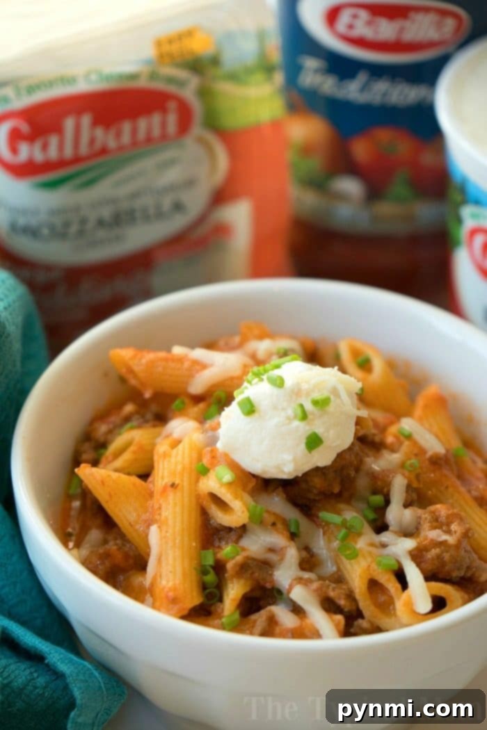 Pressure Cooker lasagna casserole recipe our whole family loves. Cheesy Instant Pot lasagna but in a casserole which makes it much easier to make! #instantpot #lasagna #casserole #pressurecooker #instantpotrecipes #thetypicalmom Pressure cooker lasagna casserole. In the background, mozzarella and pasta packages hint at the meals effortless preparation.