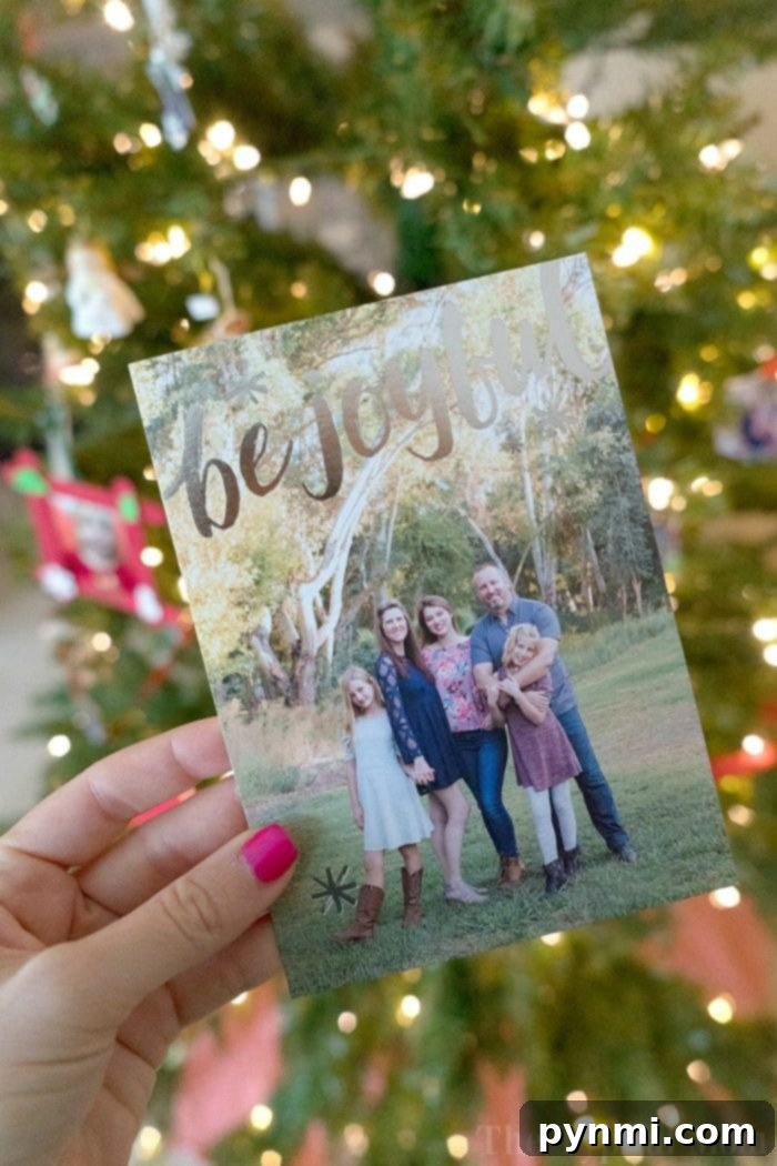 Beautifully designed customized Christmas cards featuring a family photo and festive foil-stamped details.