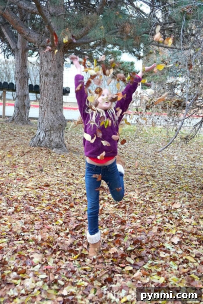 Moving during the holidays can be tough if you're in the military or relocate often for work. Here are five tips to help you and your kids transition. Family smiling happily after moving during the holidays, surrounded by a few festive decorations.