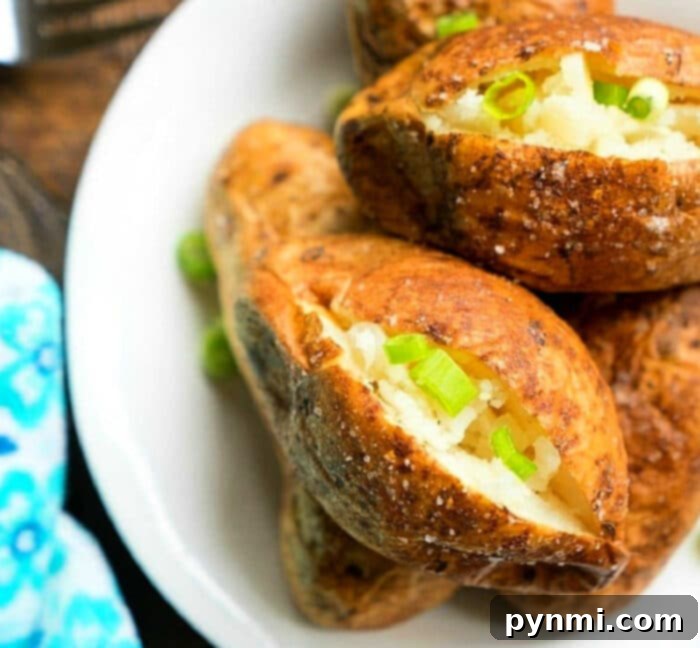 Crispy baked potatoes prepared in a Ninja Foodi, ready to be served.