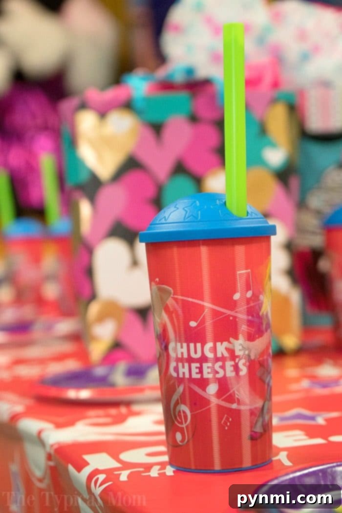 Chuck E. Cheese refillable cups, a valuable souvenir from a birthday party for unlimited drinks.