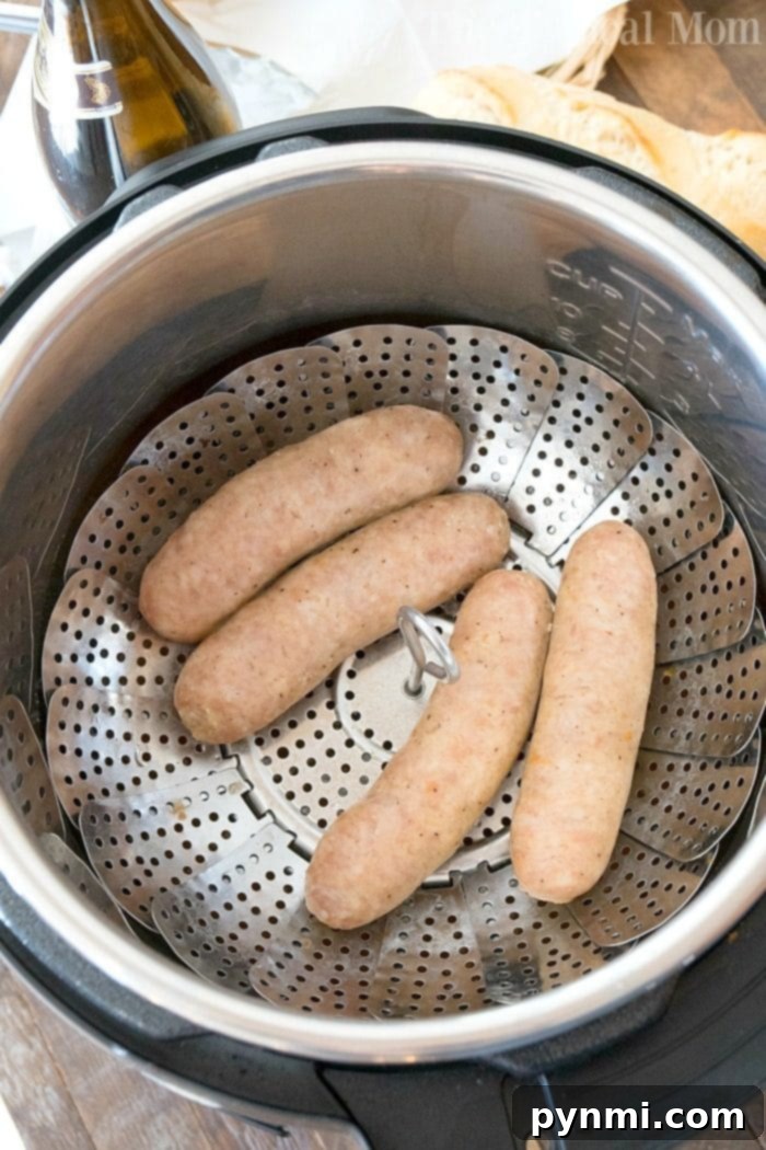 Instant Pot beer brats for a quick and flavorful meal Steamed beer brats in a pressure cooker basket, bathed in aromatic beer steam
