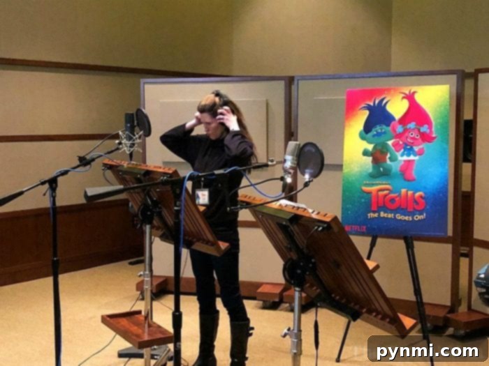 Voice Acting Experience for Trolls TV Show Person in a recording booth doing voice-over for Trolls