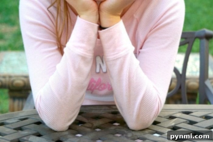 Questions to Spark Young Minds 5 Parent talking to teen about peer pressure with supportive tone