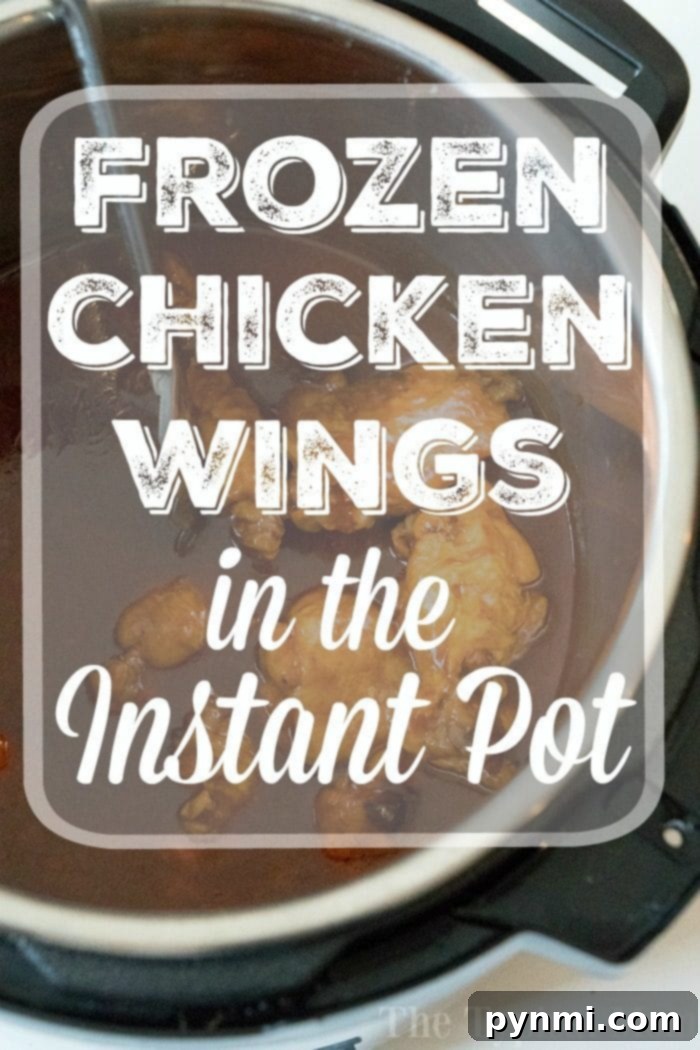 No Thawing Needed Pressure Cooker Wings 5 Pressure Cooker Frozen Chicken Wings coated in sauce, garnished with fresh herbs and sesame seeds.