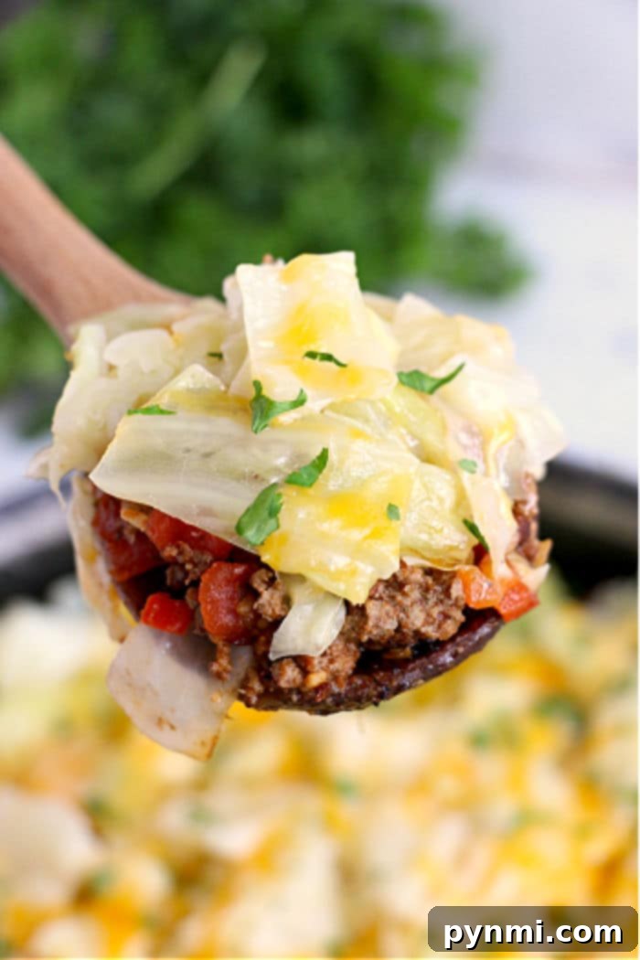 Easy Cabbage Creations 5 Hearty unstuffed cabbage casserole with a rich tomato sauce and melted cheese, a comforting family meal.