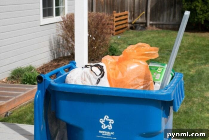 Orange garbage bags for decluttering during moving