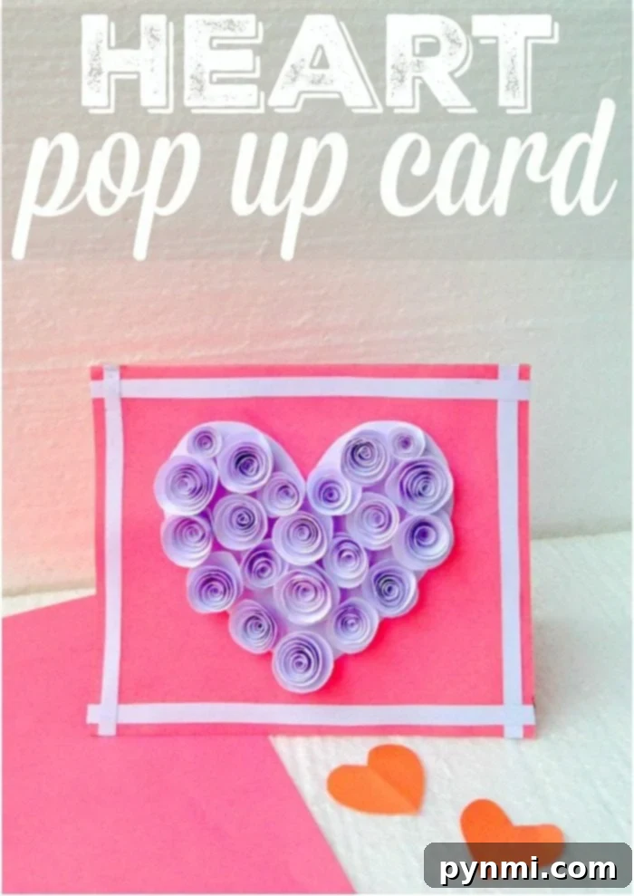 Crafting a Pop Up Heart Card 2 Beautiful handmade pop-up heart card with vibrant paper flowers, ready for Valentine's Day or Mother's Day