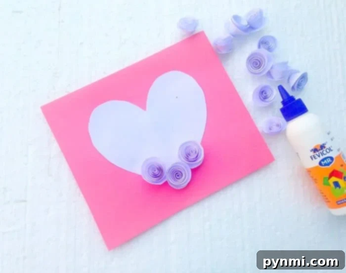 Crafting a Pop Up Heart Card 7 The finished pop-up heart card with all paper flowers glued, showcasing a full and vibrant 3D texture