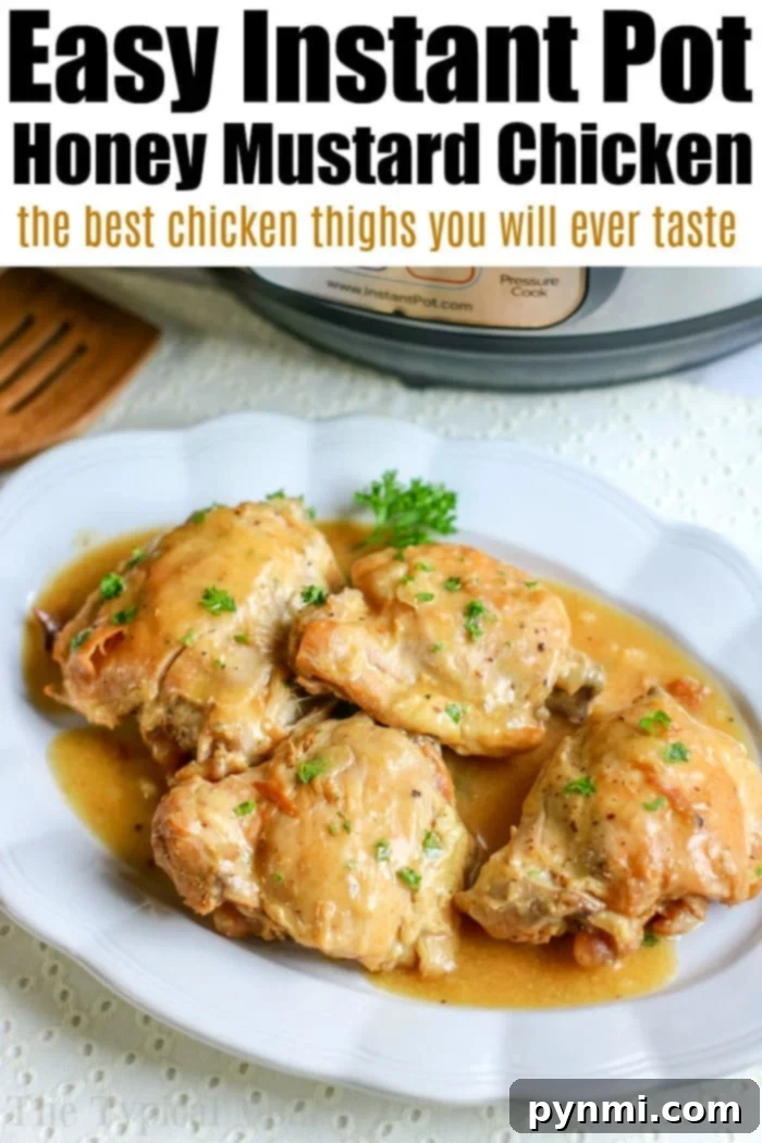 Instant Pot Honey Mustard Chicken with tender chicken thighs, bathed in a rich sauce, garnished with fresh herbs and a drizzle of honey. Served as a healthy, quick dinner option.