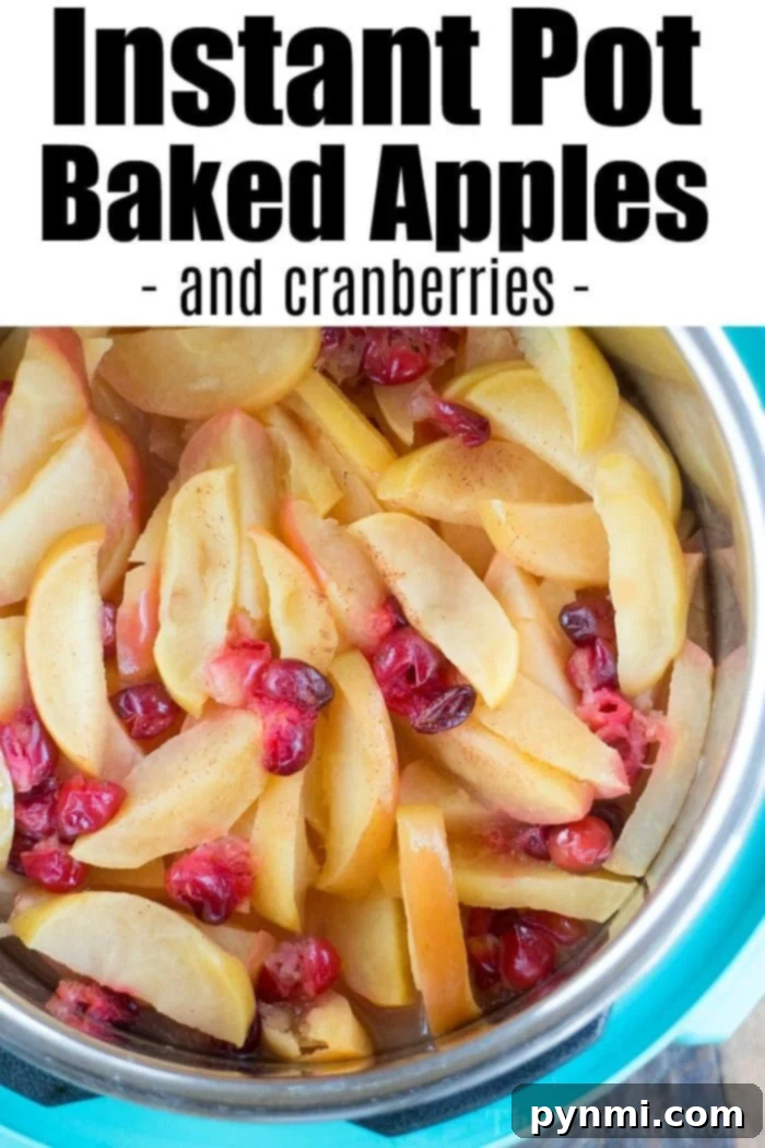 This Instant Pot apple crisp recipe is amazing! Tastes like copycat Cracker Barrel baked apples we love but made in less than 20 minutes total. Warm cinnamon apples coated with a ooey gooey brown sugar glaze your family will go crazy over for sure. Try this homemade pressure cooker fruit dessert this week! #instantpot #pressurecooker #apples #applecrisp #dessert #bakedapples #instantpotrecipes #thetypicalmom A festive Instant Pot baked apples dish with cranberries.