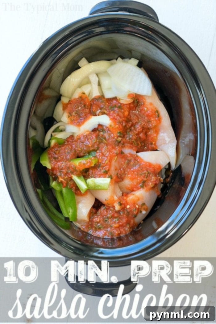 Salsa chicken crockpot recipe for an easy, healthy slow cooker dinner. Perfect for tacos or rice bowls with vegetables. Easy 10-Minute Prep Salsa Chicken in a slow cooker, featuring tender chicken breasts, onions, bell peppers, and zesty salsa for a healthy crockpot meal.