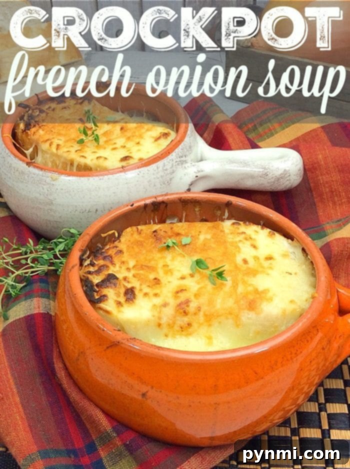 Hearty slow cooker French onion soup topped with melted cheese and a bread crouton