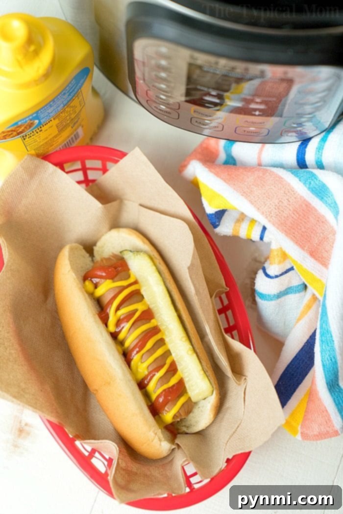 Instant Pot Hot Dogs with a delicious spread of toppings.