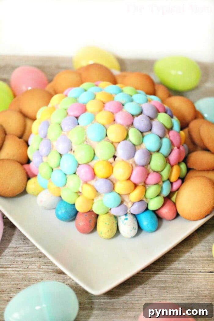 Sweet Easter Candy Cheese Ball 7 Beautifully decorated Easter cheese ball with pastel candies and dippers
